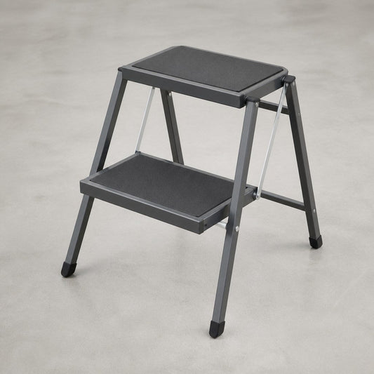 Angled view of the stool showing the top step and frame