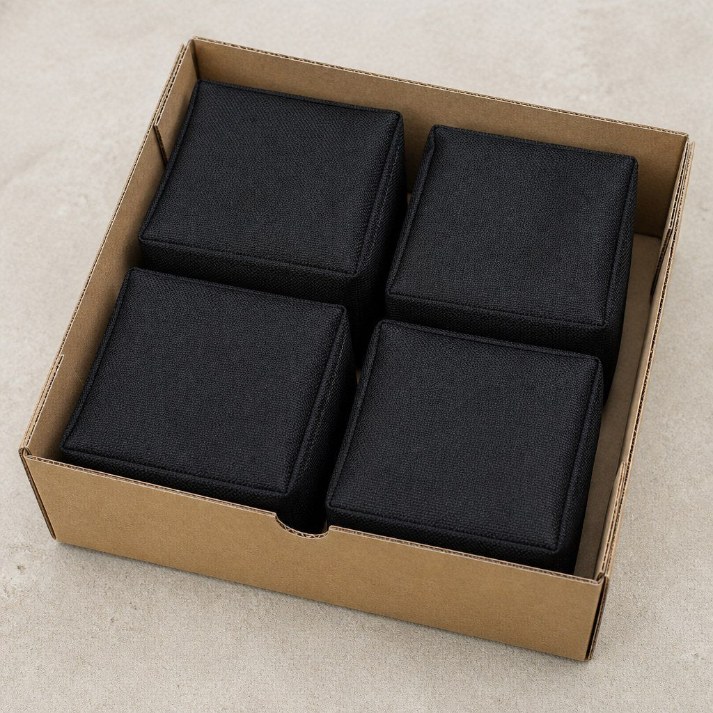 All four covers packed in a kraft box
