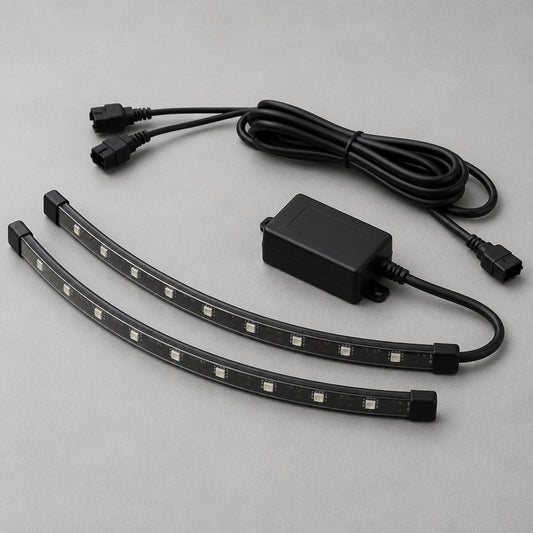 Coiled decorative underglow LED strip kit on a workbench