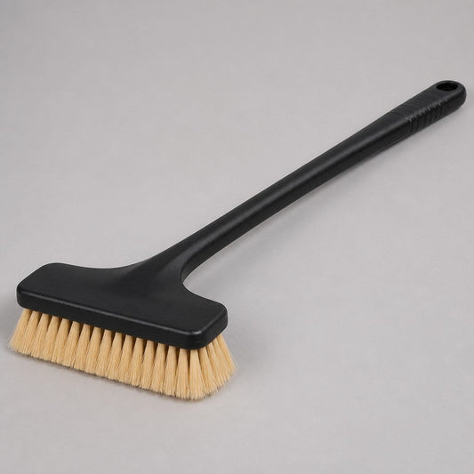 Soft-bristle truck wash brush with a 24-inch handle on a workbench